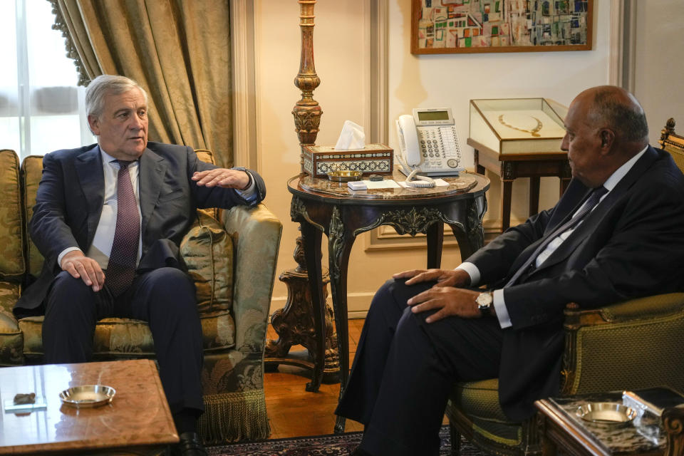 Italian Foreign Minister Antonio Tajani, left, meets with his Egyptian counterpart Sameh Shoukry in Cairo, Egypt, Wednesday, Oct. 11, 2023. (AP Photo/Amr Nabil)