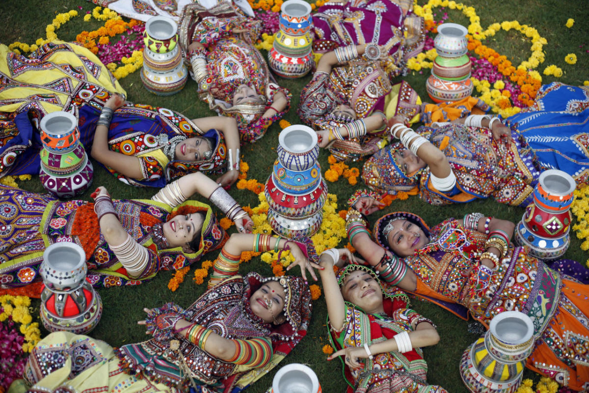 Two Fakirani women in traditional colorful clothes smiling, Great Rann of  Kutch, Gujarat, India Stock Photo - Alamy