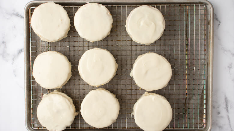 circular cakes with white frosting