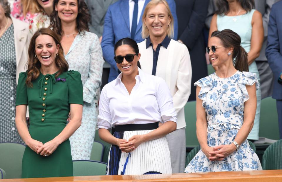<p>Kate and Meghan attend the Women's Final together, joined by Kate's sister Pippa.</p>