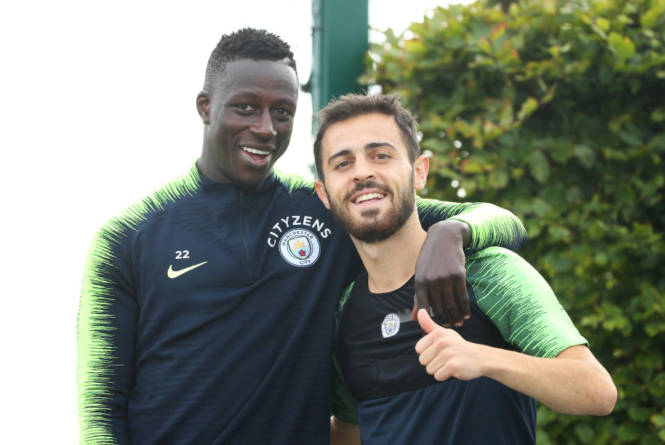 MANCHESTER, ENGLAND - AUGUST 30: Manchester City's Benjamin Mendy poses with Bernardo Silva during training at Manchester City Football Academy on August 30, 2018 in Manchester, England. (Photo by Tom Flathers/Manchester City FC via Getty Images)