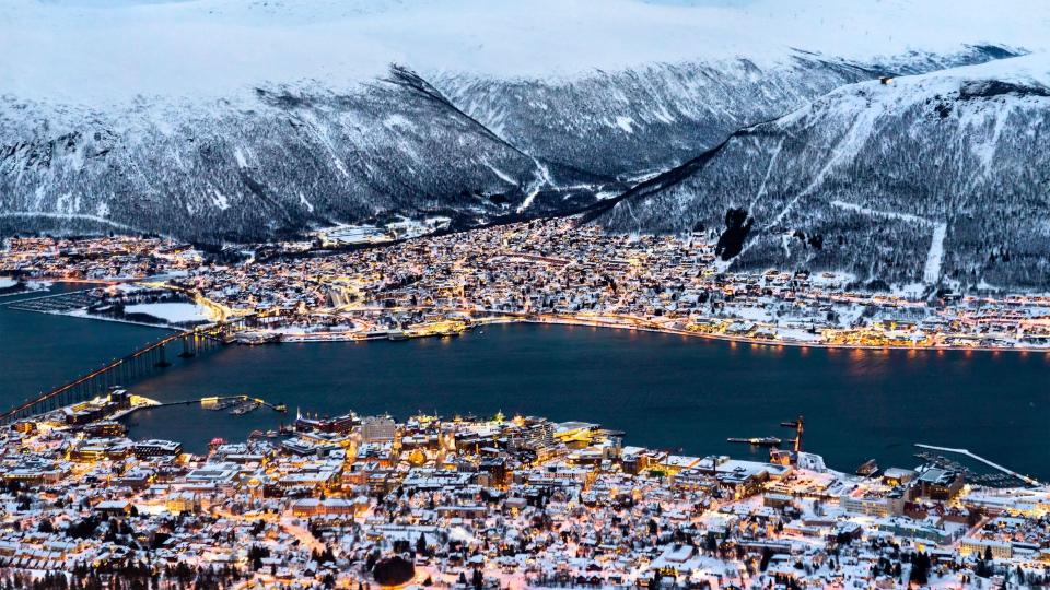 Aerial view of the snow covered town Tromso in Northern Norway