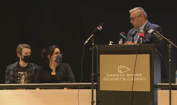 Federation of Sovereign Indigenous Nations Vice-Chief David Pratt, right, addresses Annette Custer and her partner during a press conference Tuesday at the Dakota Dunes Resort Hotel in Saskatoon. 