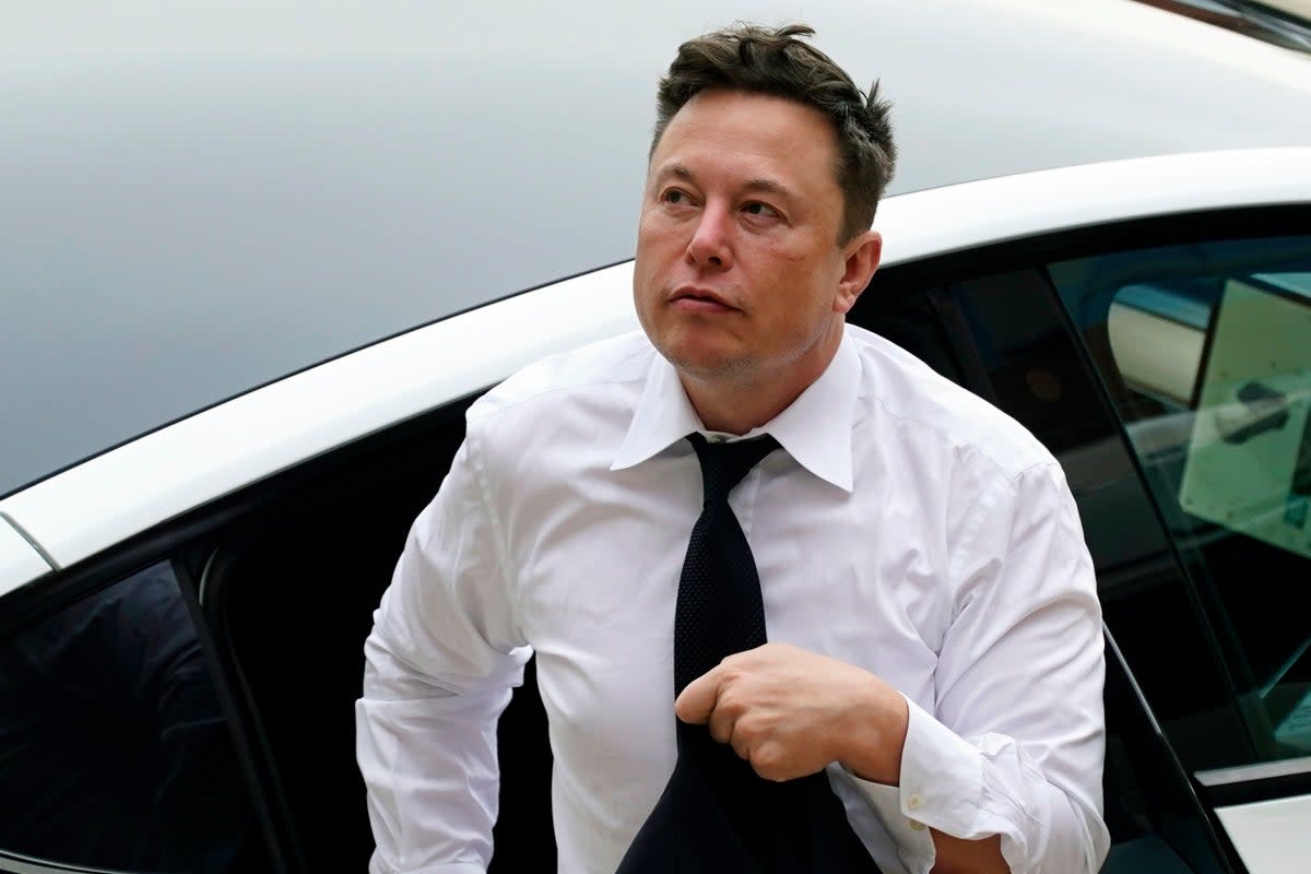 Elon Musk arrives at a Delaware courthouse in July 2021  (AP Photo/Matt Rourke)