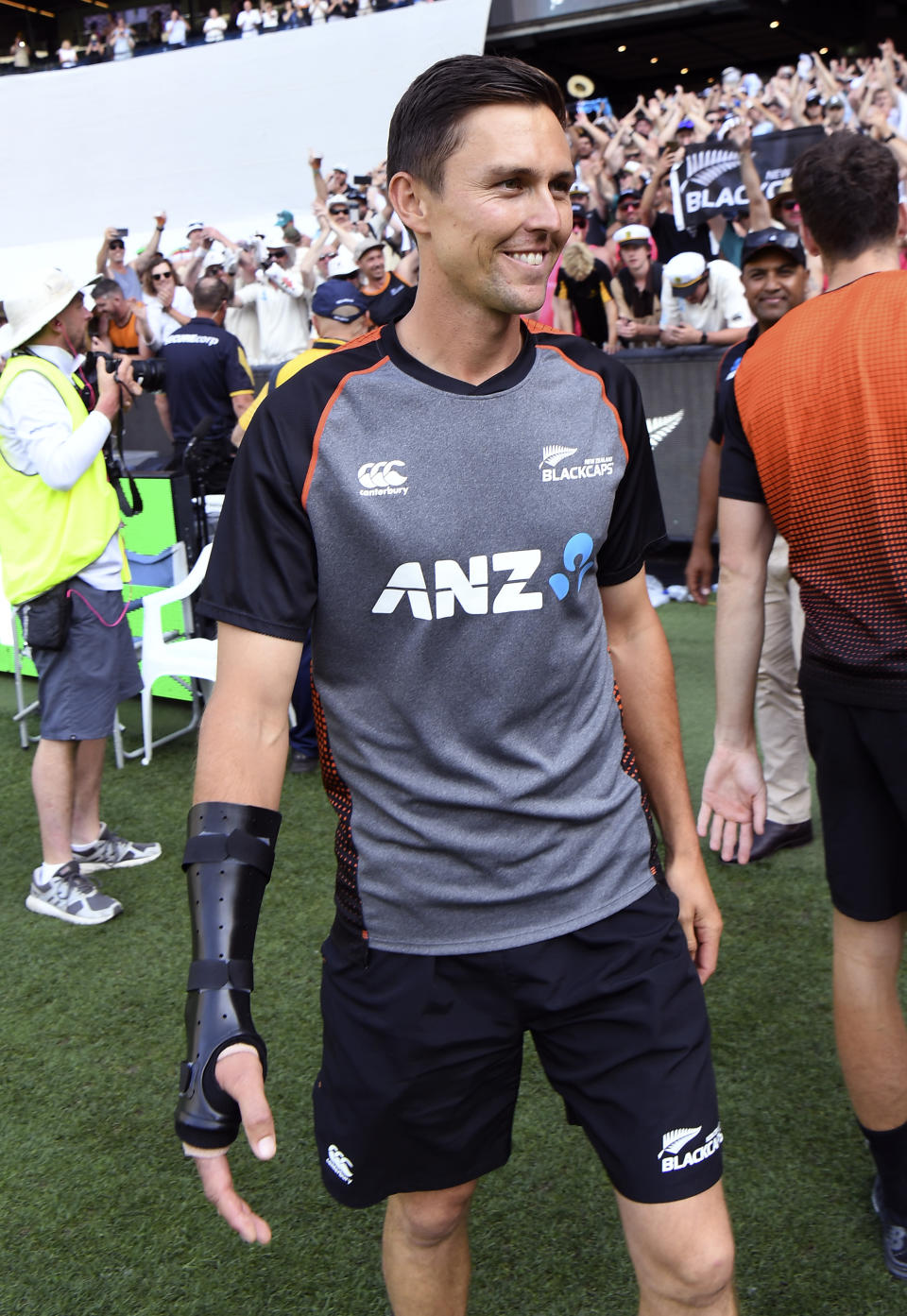 New Zealand player Trent Boult smiles after New Zealand lost to Australia.