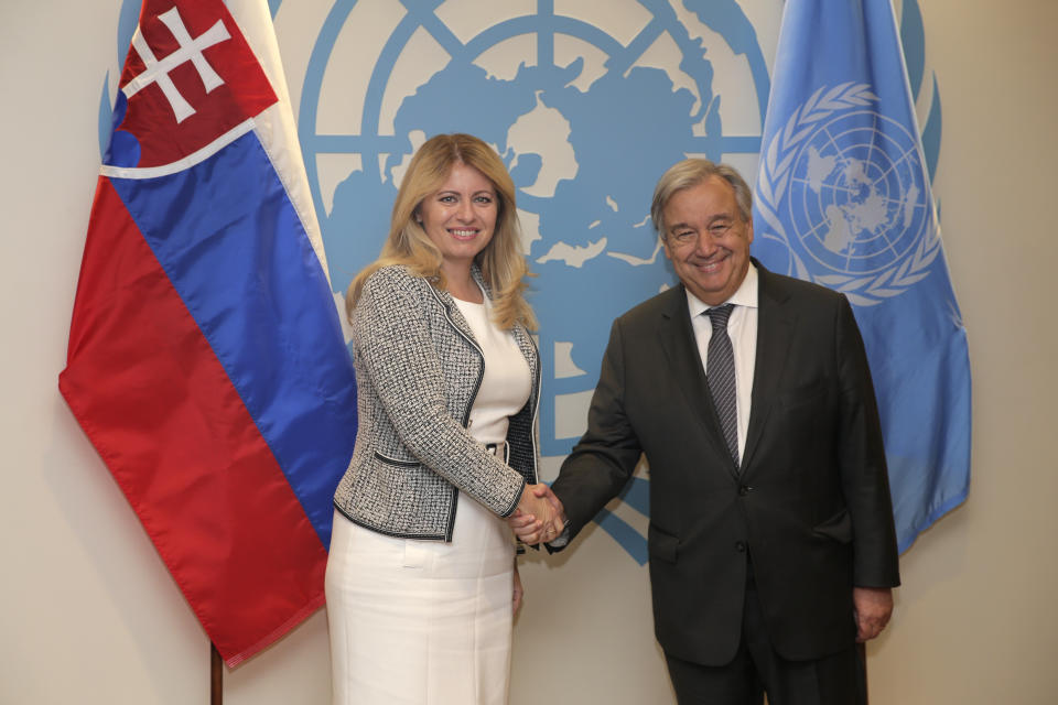 Zuzana Caputova, President of Slovakia, poses for a picture with United Nations Secretary-General Antonio Guterres at U.N. headquarters Wednesday, Sept. 25, 2019. (AP Photo/Seth Wenig)