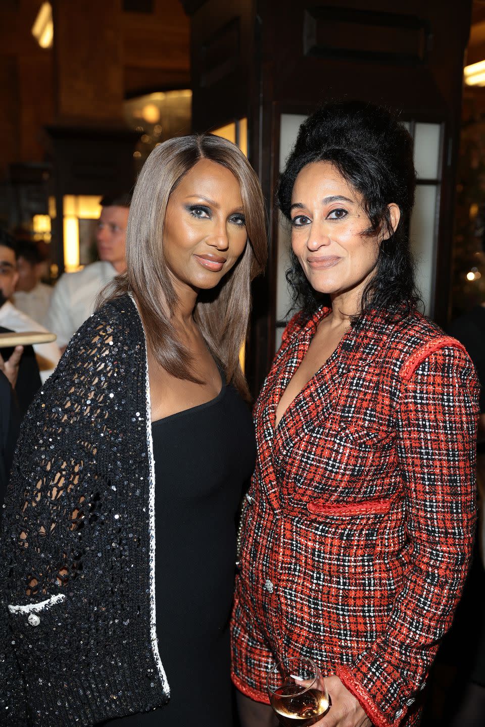 new york, new york june 12 l r iman and tracee ellis ross, wearing chanel, attend chanel tribeca festival artists dinner at balthazar on june 12, 2023 in new york city photo by dimitrios kambouriswireimage