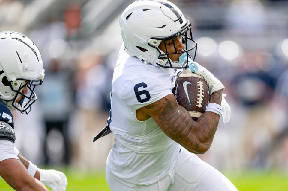 Penn State wide receiver Harrison Wallace III cuts down the field with the ball during the Blue-White game on Saturday, April 13, 2024.