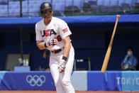 United States' Triston Casas (26) tosses his bat after a walk during a baseball game against the Dominican Republic at the 2020 Summer Olympics, Wednesday, Aug. 4, 2021, in Yokohama, Japan. (AP Photo/Sue Ogrocki)