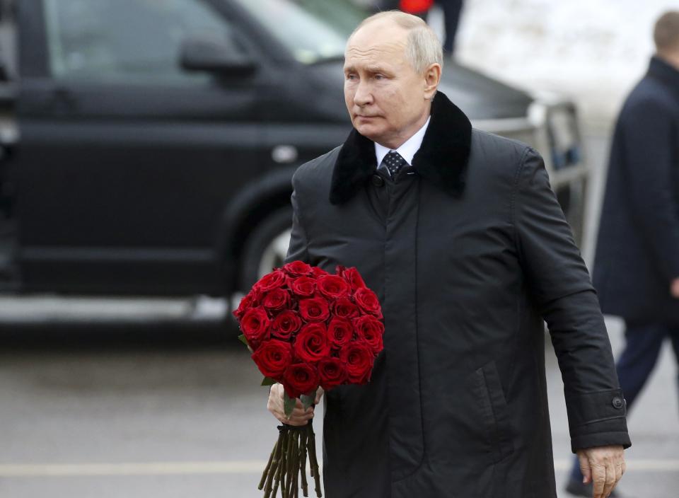 Russian President Vladimir Putin walks to place flowers on a monument at Nevsky Pyatachok near Kirovsk, 33 km (21 miles) east of St. Petersburg, Russia, Saturday Jan. 27, 2024. The ceremony marked the 80th anniversary of the battle that lifted the Siege of Leningrad. The Nazi siege of Leningrad, now named St. Petersburg, was fully lifted by the Red Army on Jan. 27, 1944. More than 1 million people died mainly from starvation during the nearly 900-day siege. (Konstantin Zavrazhin, Sputnik, Kremlin Pool Photo via AP)