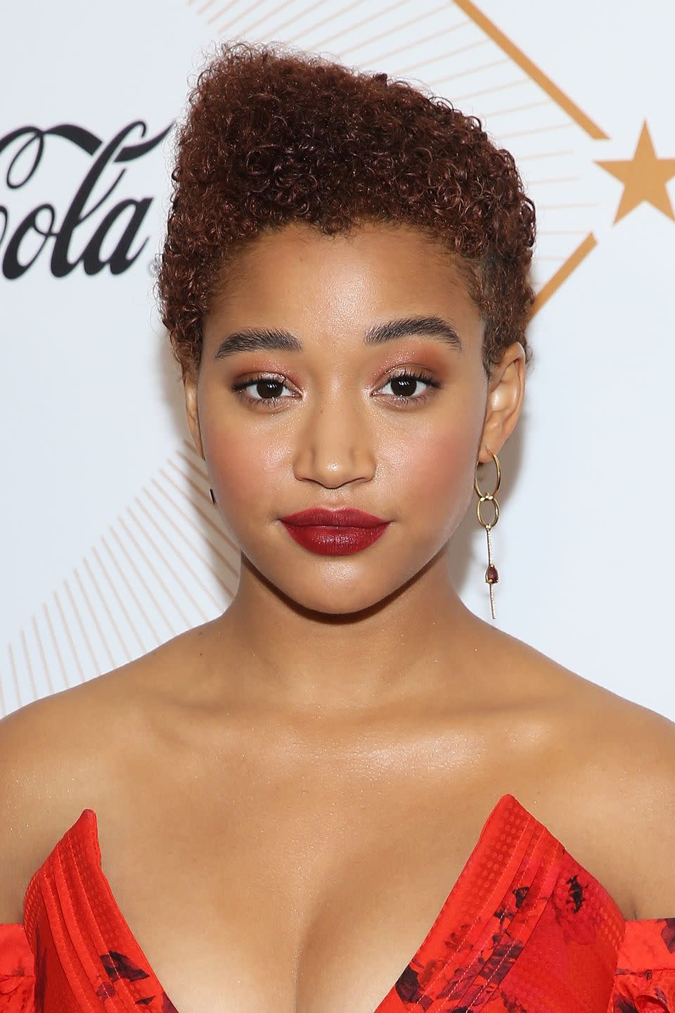 <p>It's all about the angles! Actress <strong>Amandla Stenberg</strong> asymmetrically styles her short curly hair for a sophisticated look. Curls are here to stay for naturalistas, Porsche says. "For the curly/natural girls, focusing on the <a href="https://www.goodhousekeeping.com/beauty/hair/a28494129/healthy-hair/" rel="nofollow noopener" target="_blank" data-ylk="slk:health of the hair;elm:context_link;itc:0;sec:content-canvas" class="link ">health of the hair </a>will be a big deal this year!" she adds. </p>