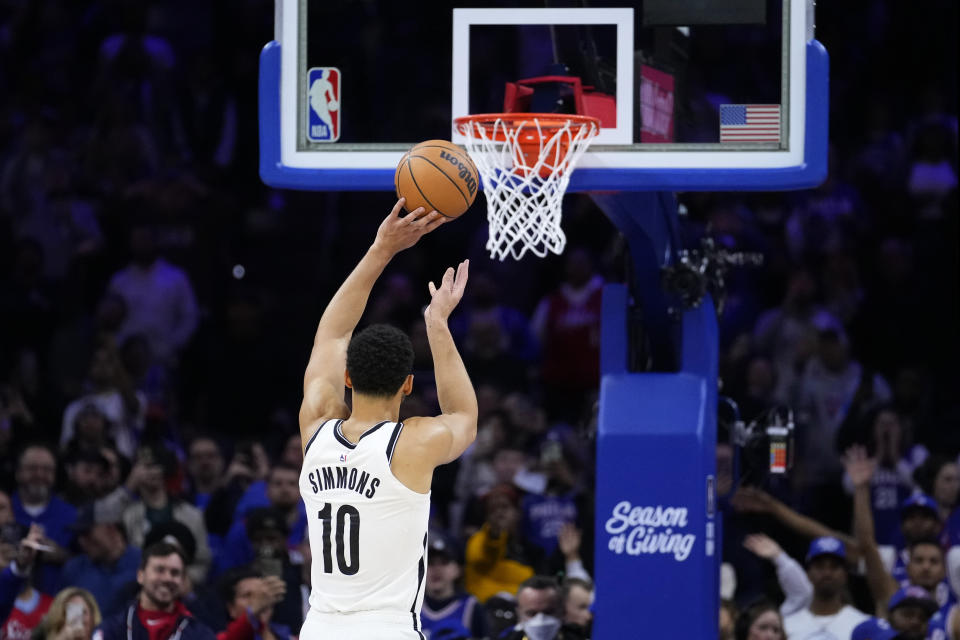 Brooklyn Nets' Ben Simmons shoots a free-throw during the first half of an NBA basketball game against the Philadelphia 76ers, Tuesday, Nov. 22, 2022, in Philadelphia. (AP Photo/Matt Slocum)