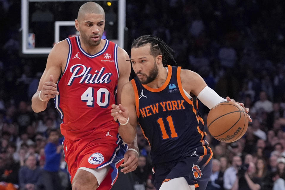 Philadelphia 76ers' Nicolas Batum (40) defends against New York Knicks' Jalen Brunson (11) during the second half of Game 2 in an NBA basketball first-round playoff series Monday, April 22, 2024, in New York. (AP Photo/Frank Franklin II)