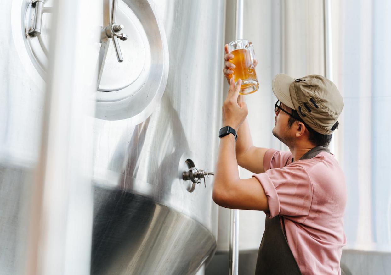 Brewers today are delivering nonalcoholic beers that are a far cry from the sweet, watery options of the past. <a href="https://www.gettyimages.com/detail/photo/asian-brewer-filling-beer-in-glass-from-tank-at-royalty-free-image/1402489303" rel="nofollow noopener" target="_blank" data-ylk="slk:Pramote Polyamate/Moment via Getty Images;elm:context_link;itc:0;sec:content-canvas" class="link ">Pramote Polyamate/Moment via Getty Images</a>