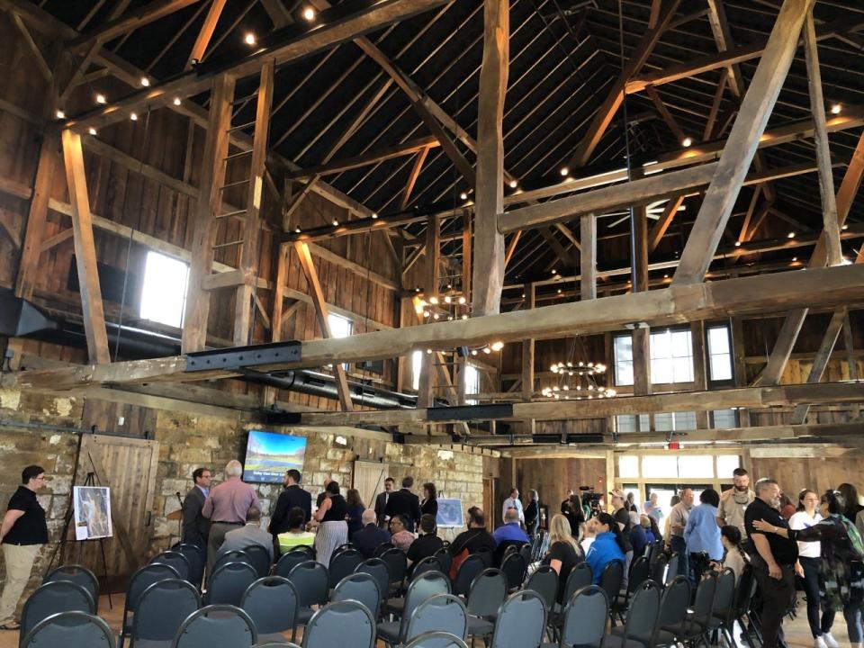 People gather before the start of the Valley View River Celebration in the Himelright Lodge in the Valley View Area of Cascade Valley Metro Park in Akron.