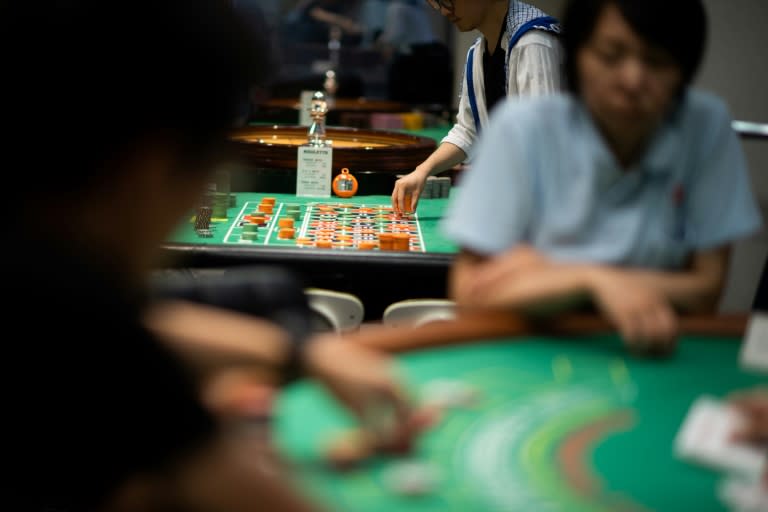 Owner Masayoshi Oiwane says interest has skyrocketed in his casino school, where would-be croupiers learn to deal baccarat games, spin the roulette wheel and supervise betting on the green baize tables