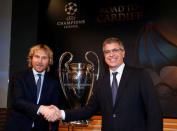 Juventus' Vice Chairman Pavel Nedved (L) shakes hands with FC Barcelona's Vice President Jordi Mestre after the draw of the UEFA Champions League quarterfinals in Nyon, Switzerland March 17, 2017. REUTERS/Denis Balibouse