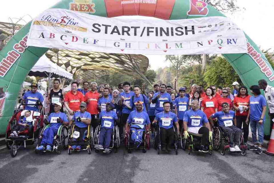 Participants from all walks of life took part in the run, including those with special needs and disabilities. — Picture by Miera Zulyana