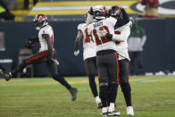 Tampa Bay Buccaneers quarterback Tom Brady celebrates with his teammates after winning the NFC championship NFL football game against the Green Bay Packers in Green Bay, Wis., Sunday, Jan. 24, 2021. The Buccaneers defeated the Packers 31-26 to advance to the Super Bowl. (AP Photo/Jeffrey Phelps)