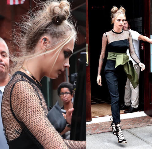 <p>Cara’s two bun hair-do is just TOO cute. If only we had the patience to do it ourselves… <i>[Photo: Getty]</i></p>