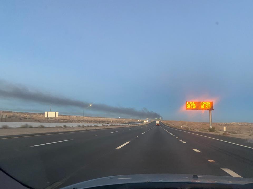 Thick clouds of black smoke could be seen emanating miles away from a house fire in Barstow around 5 a.m. on July 11, 2022.