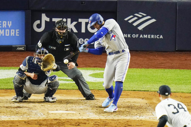 Springer answers boos with homer, 3 RBIs to lift Blue Jays over