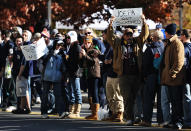 STATE COLLEGE, PA - NOVEMBER 12: A fan holds up a sign that reads "Joe Pa Got Screwed" before Penn State players make their way into the stadium before playing Nebraska in a college football game at Beaver Stadium on November 12, 2011 in State College, Pennsylvania. Head football coach Joe Paterno was fired amid allegations that former Penn State defensive coordinator Jerry Sandusky was involved with child sex abuse. Penn State is playing their final home football game against Nebraska. (Photo by Patrick Smith/Getty Images)