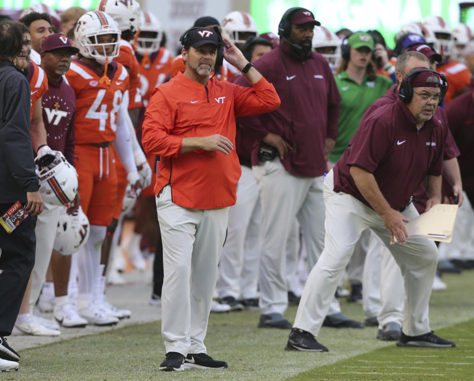 Virginia Tech head coach Brent Pry stands on the sideline after an delay due to severe weather during an NCAA college football game against Purdue in Blacksburg, Va., Saturday, Sept. 9 2023. (Matt Gentry/The Roanoke Times via AP)