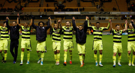 Britain Football Soccer - Wolverhampton Wanderers v Huddersfield Town - Sky Bet Championship - Molineux - 25/4/17Huddersfield Town players celebrate as they confirmed a playoff place after the matchMandatory Credit: Action Images / Andrew CouldridgeLivepic