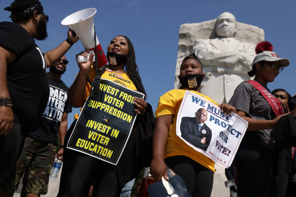 Activists participate in a “Freedom Friday March” protest at the Martin Luther King Jr. Memorial on Aug. 6, 2021, in Washington, DC.