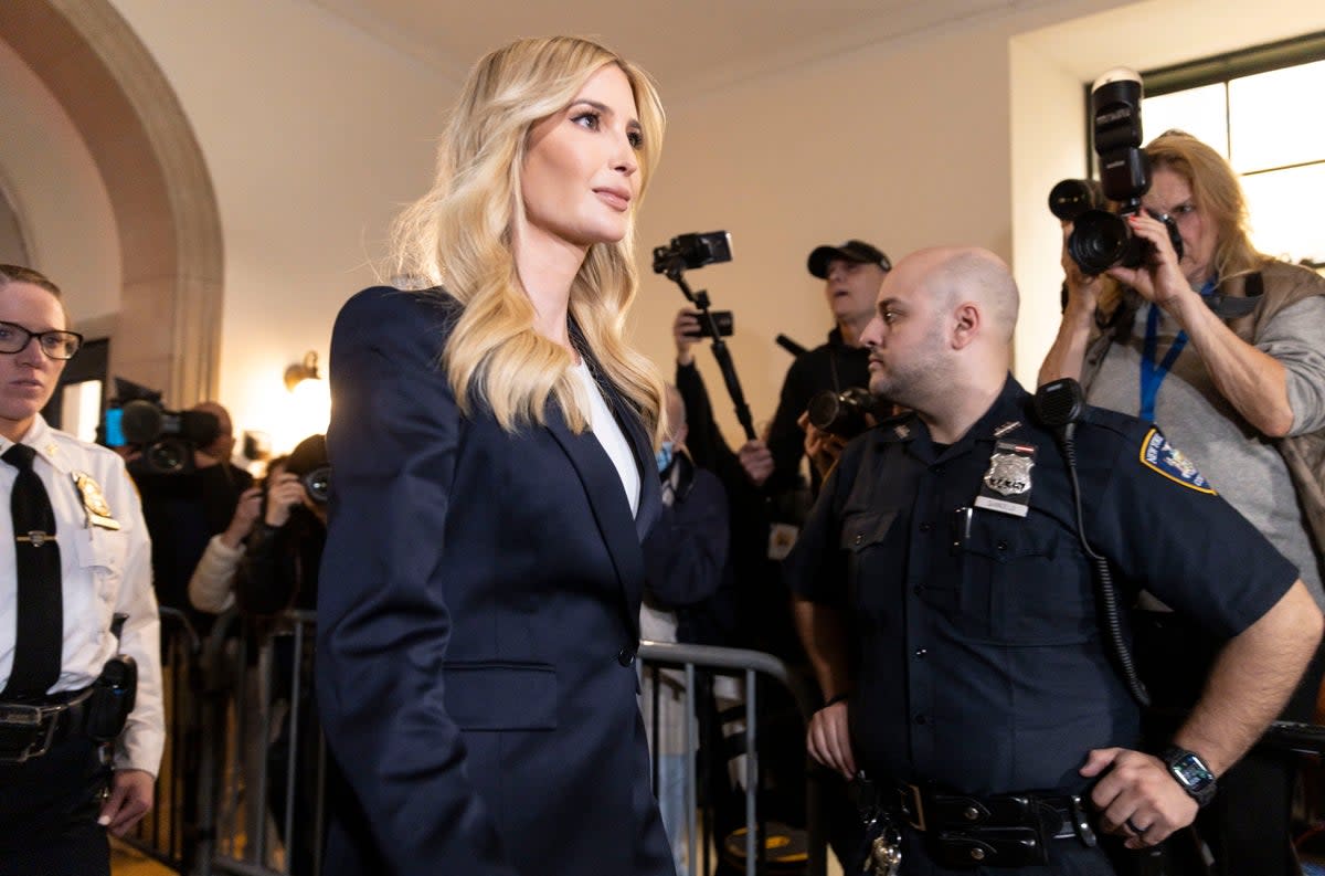 Ivanka Trump arrives at the doors of Judge Arthur Engoron’s courtroom on 8 November to testify in a fraud trial targeting her family’s business. Cameras are not allowed inside the courtroom (EPA)
