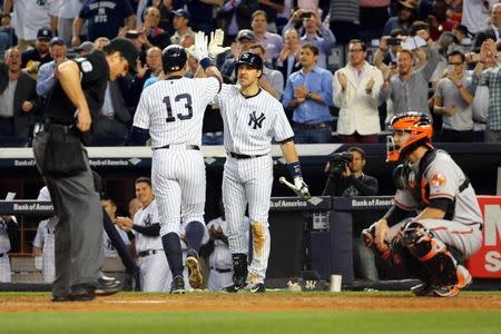 May 7, 2015; Bronx, NY, USA; New York Yankees designated hitter Alex Rodriguez (13) celebrates his 661 home run surpassing the record of Willie Mays during the third inning against the Baltimore Orioles at Yankee Stadium. Mandatory Credit: Anthony Gruppuso-USA TODAY Sports - RTX1C157