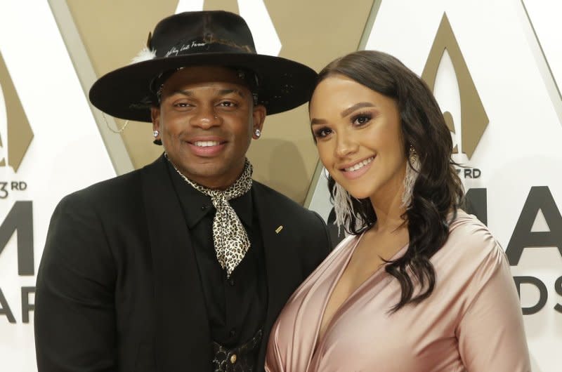 Jimmie Allen (L) and Alexis Gale attend the Country Music Association Awards in 2019. File Photo by John Angelillo/UPI