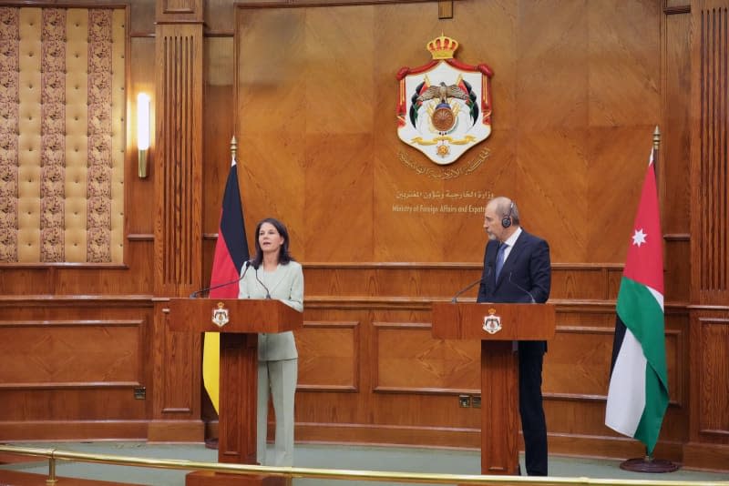 German Foreign Minister Annalena Baerbock speaks during a joint press conference with Jordanian Foreign Minister Ayman Safadi after their meeting. Soeren Stache/dpa