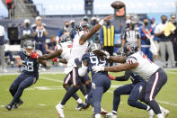 Houston Texans quarterback Deshaun Watson (4) passes against the Tennessee Titans in the first half of an NFL football game Sunday, Oct. 18, 2020, in Nashville, Tenn. (AP Photo/Mark Zaleski)