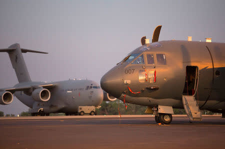 A supplied photo shows a Royal Australian Air Force (RAAF) No. 35 Squadron C-27J Spartan next to a No. 36 Squadron C-17 Globemaster III ahead of Exercise Pitch Black 2018 at the Royal Australian Air Force (RAAF) Base in Darwin, Australia, July 23, 2018. Picture taken July 23, 2018. Australian Defence Force/Handout via REUTERS