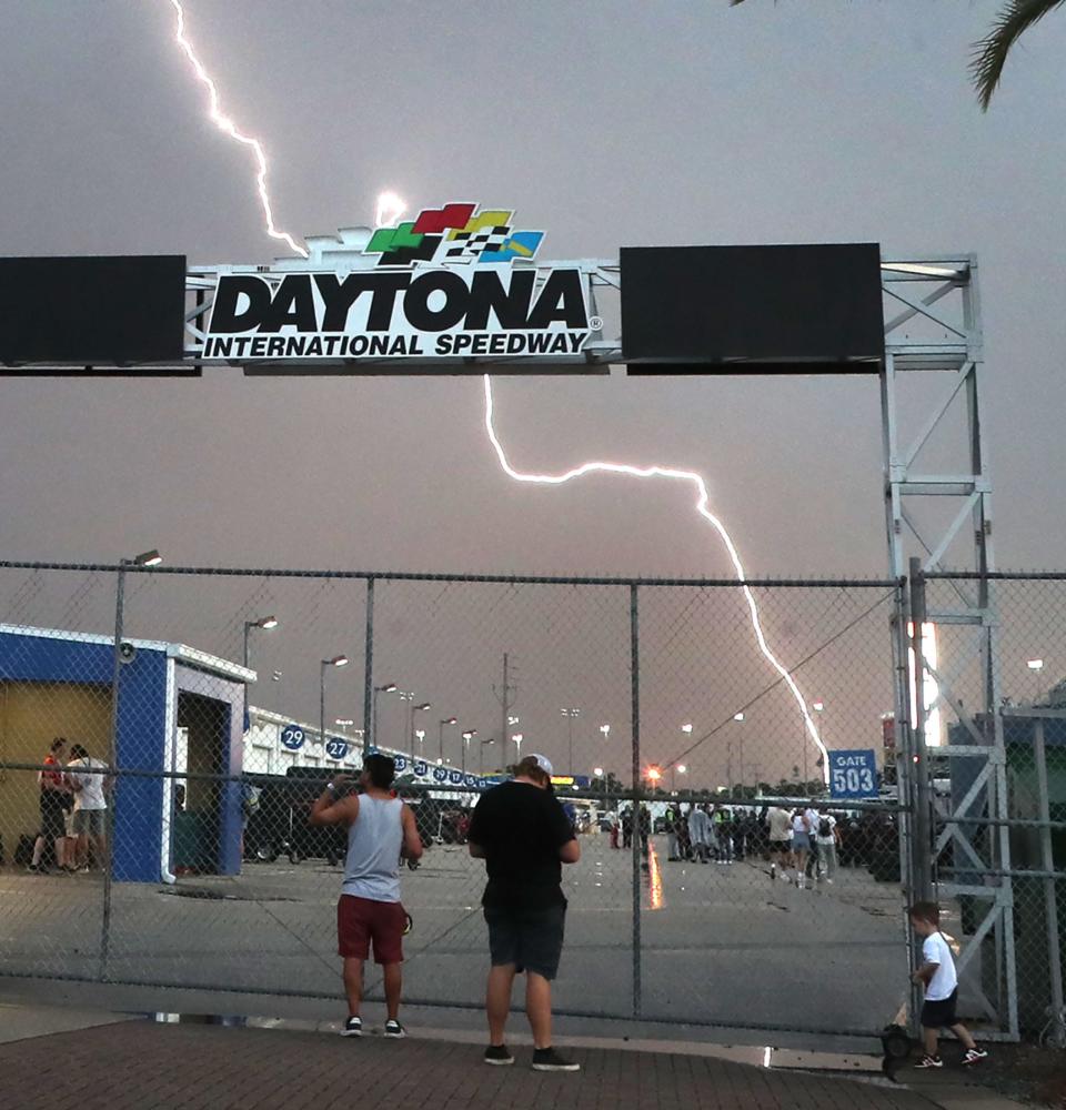 In this file photo, a lightning bolt flashes west of Daytona International Speedway.