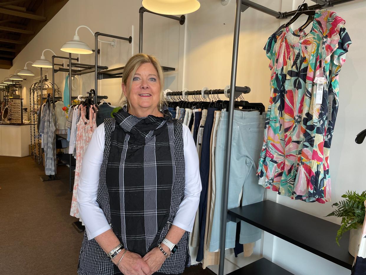 Beverly Rae's owner Debbie Carley stands in her downtown Brighton fashion boutique on Wednesday, June 28, 2023.