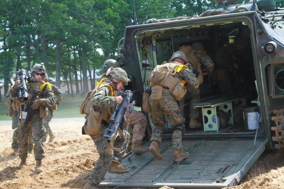 Marines board an amphibious assault vehicle