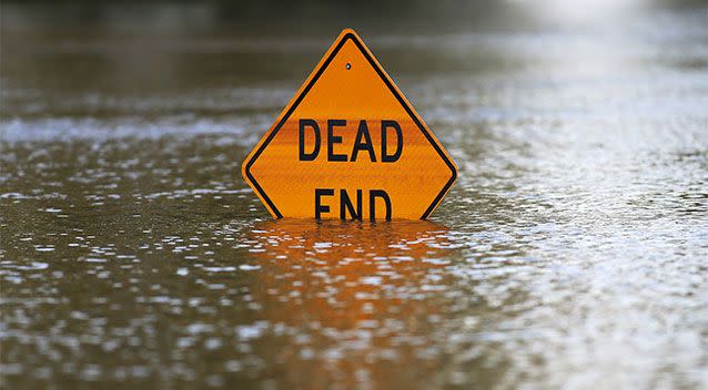 A sign is partially submerged in Louisiana caused by flooding from the Red River following storms in neighbouring Oklahoma and Texas. Photo: AP Photo/Jonathan Bachman