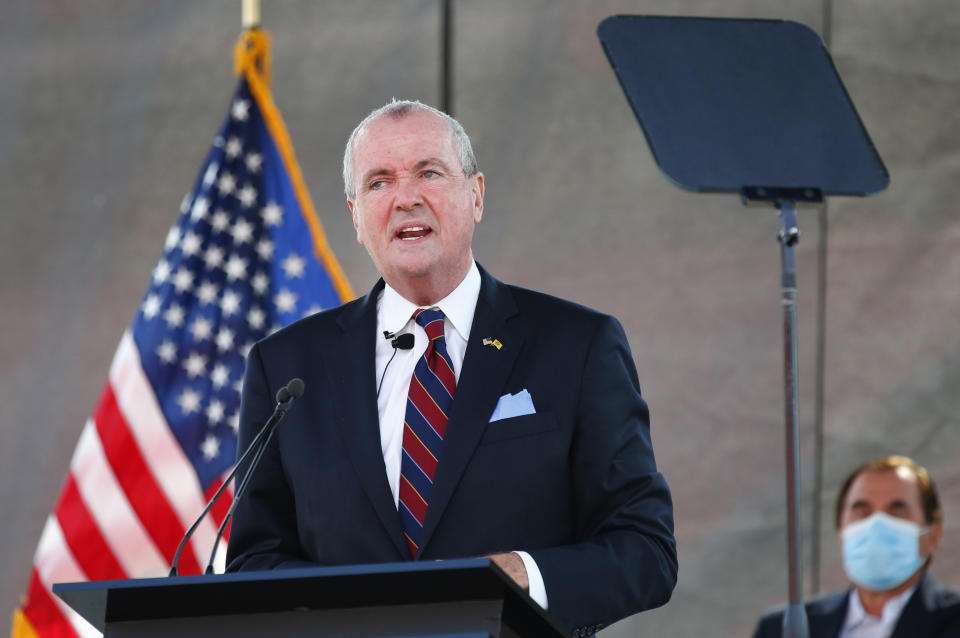 FILE - In this Aug. 25, 2020, file photo, New Jersey Gov. Phil Murphy speaks during his 2021 budget address at SHI Stadium at Rutgers University in Piscataway, N.J.  Faulting inaction in Washington, governors and state lawmakers are racing to get needed pandemic relief to small businesses, the unemployed, renters and others affected by the widening coronavirus outbreak.    (AP Photo/Noah K. Murray, File)