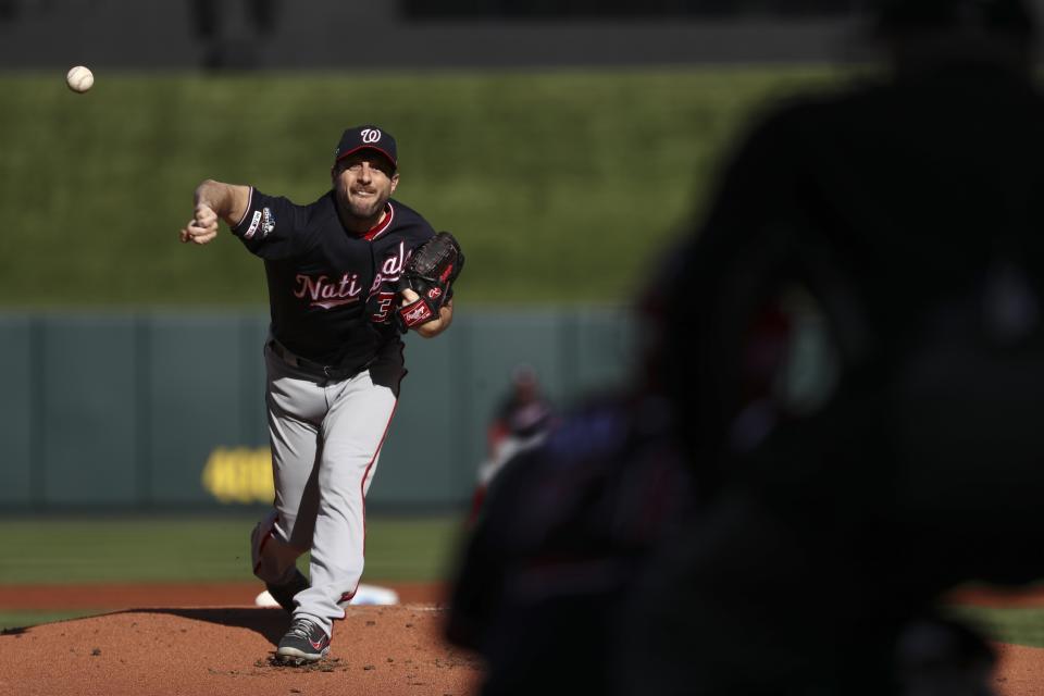 Washington Nationals starting pitcher Max Scherzer throws during the first inning of Game 2 of the baseball National League Championship Series against the St. Louis Cardinals Saturday, Oct. 12, 2019, in St. Louis. (AP Photo/Jamie Squire, Pool)