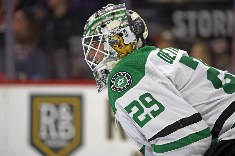 Dallas Stars goaltender Jake Oettinger watches the puck during the third period of an NHL hockey game against the Carolina Hurricanes in Raleigh, N.C., Saturday, Feb. 24, 2024. (AP Photo/Karl B DeBlaker)