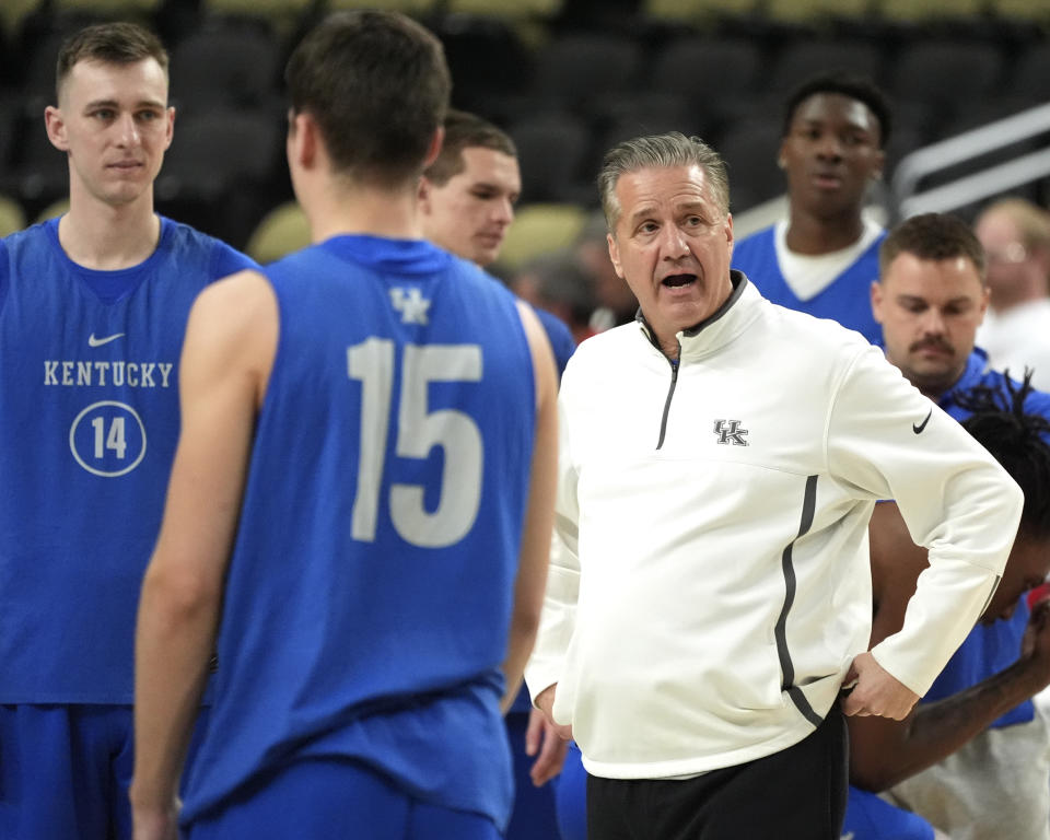 Kentucky head coach John Calipari, right, gives directions during NCAA college basketball team practice at PPG Paints Arena in Pittsburgh, Wednesday, March 20, 2024. Kentucky faces Oakland in the first round of the NCAA Tournament Thursday. (AP Photo/Gene J. Puskar)