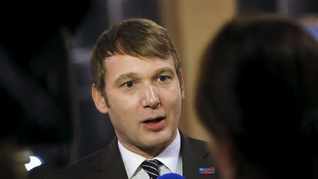 Andre Poggenburg of the right-wing Alternative for Germany (AFD) gives an TV interview during a rally for the upcoming Saxony-Anhalt state elections in Bitterfeld, Germany, February 29, 2016. REUTERS/Fabrizio Bensch