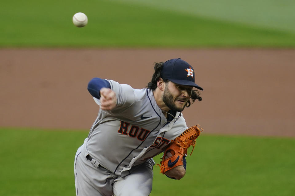 Houston Astros starting pitcher Lance McCullers Jr. throws against the Seattle Mariners in the first inning of a baseball game Monday, Sept. 21, 2020, in Seattle. (AP Photo/Elaine Thompson)