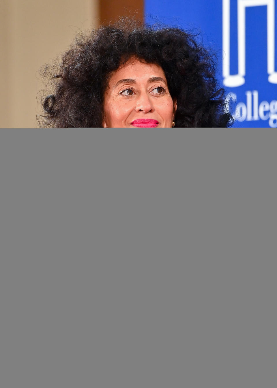Tracee Ellis Ross with curly layered hair.