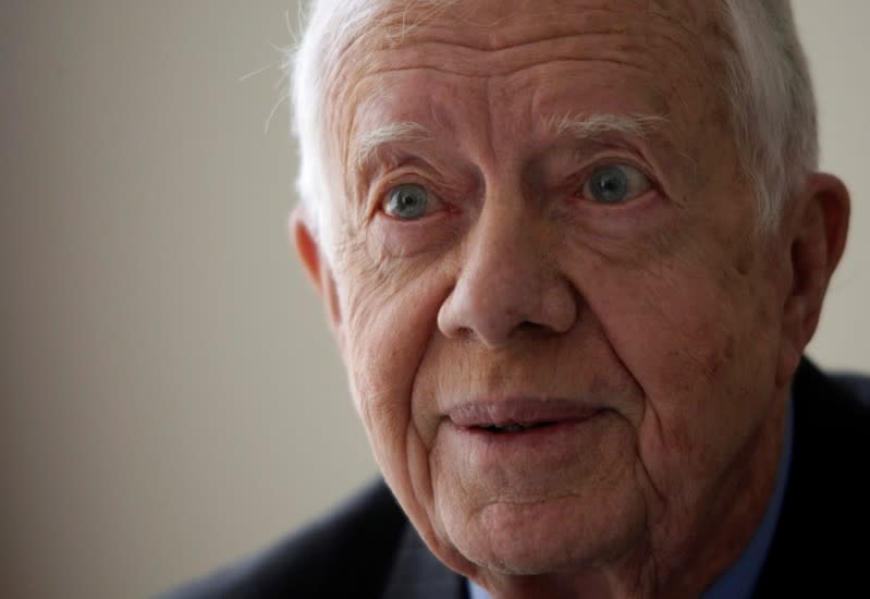FILE PHOTO: Former U.S. President Jimmy Carter speaks during a Reuters interview in La Paz