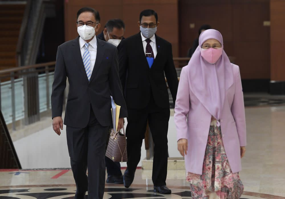 Opposition Leader Datuk Seri Anwar Ibrahim and his wife Datuk Seri Dr Wan Azizah Wan Ismail are pictured at Parliament, Kuala Lumpur July 29, 2021. — Bernama pic