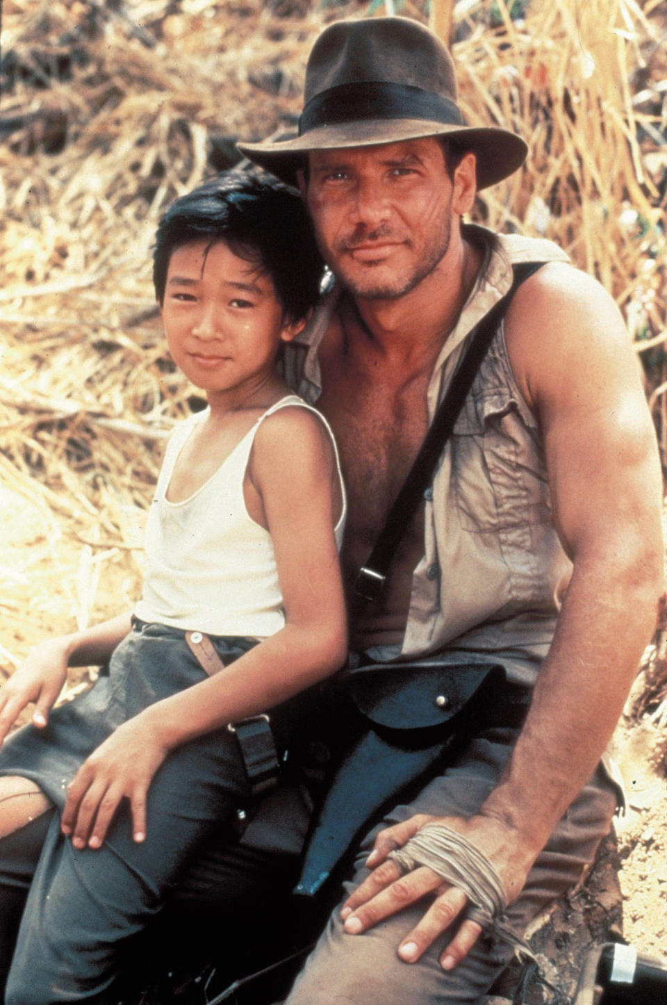 Harrison Ford and Jonathan Ke Quan in Indiana Jones and the Temple of Doom. 1984. (Lucasfilm via Alamy )
